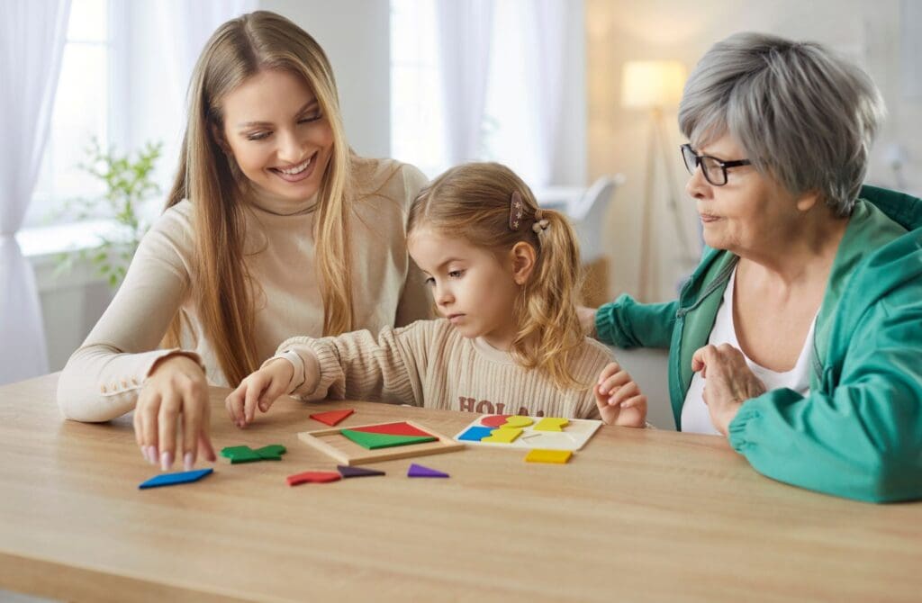 The sandwich generation is defined as middle-aged adults who take care of both older parents and their children. Here we see three generations of women.